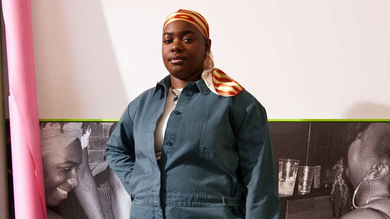 Photographer Bernice Mulenga wearing the Lick Teal 03 Jumpsuit